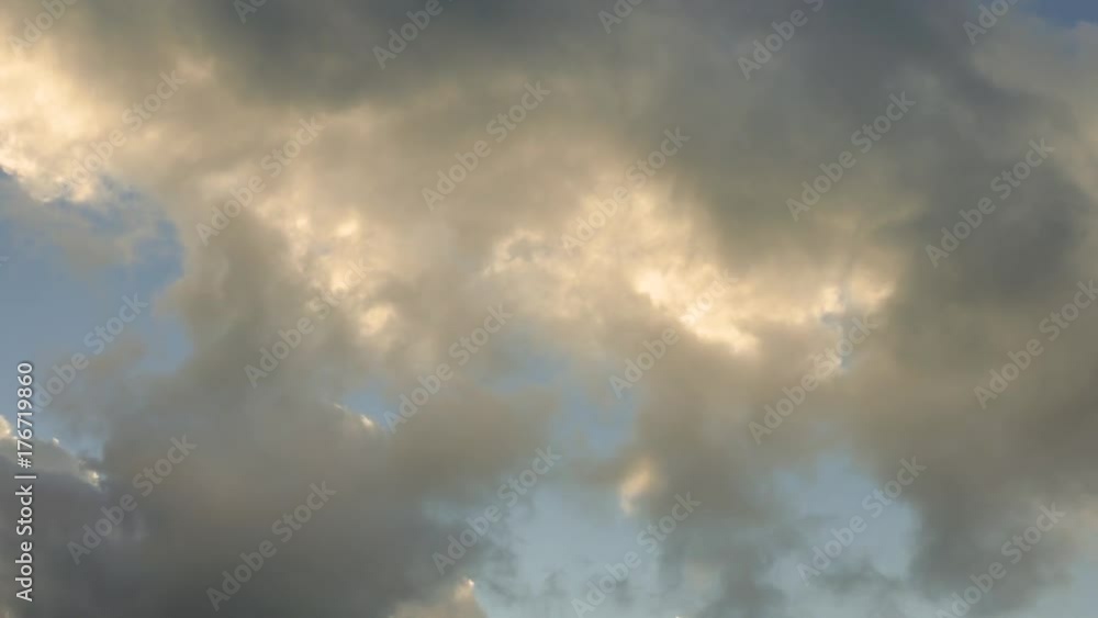 Quickly passing white clouds, time lapse / Dark stormy clouds in blue sky, time lapse Quickly passing white clouds, time lapse / Dark stormy clouds in blue sky, time lapse