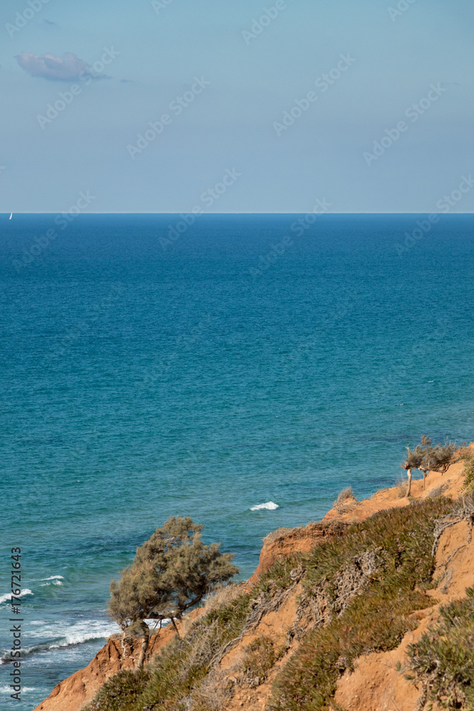 The Mediterranean shore, as seen from a cliff