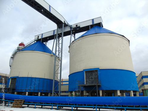 Buildings and structures at an industrial woodworking plant.