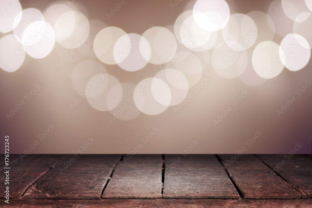 Wood table top on abstract bokeh background of lights for Happy New Year and Merry Christmas vintage tone Wood table top on abstract bokeh background of lights for Happy New Year and Merry Christmas vintage tone