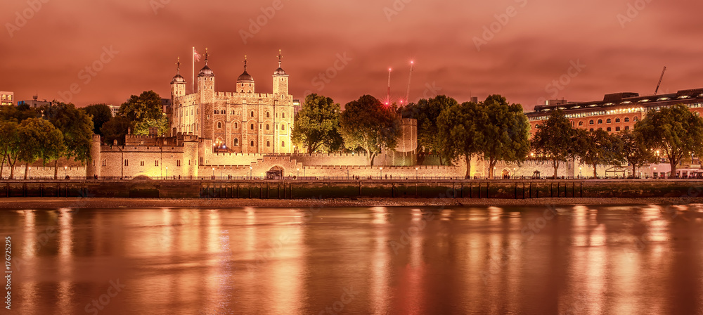 London, the United Kingdom: the Tower from the River Thames at night