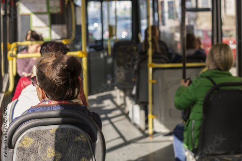 Passengers go to the bus around the city