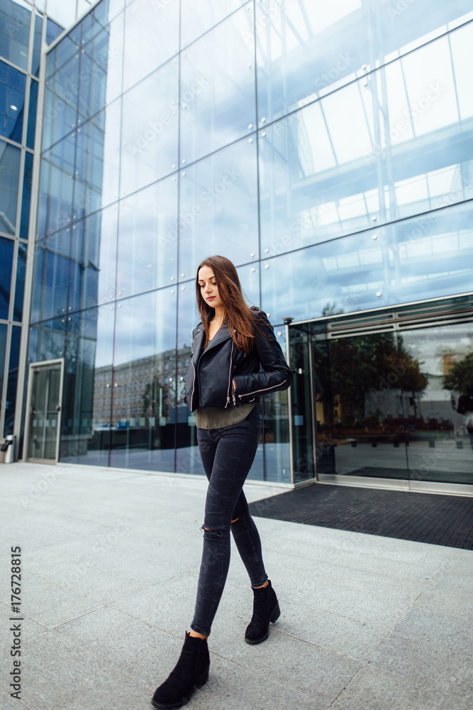 Business woman stand near building Business woman stand near building