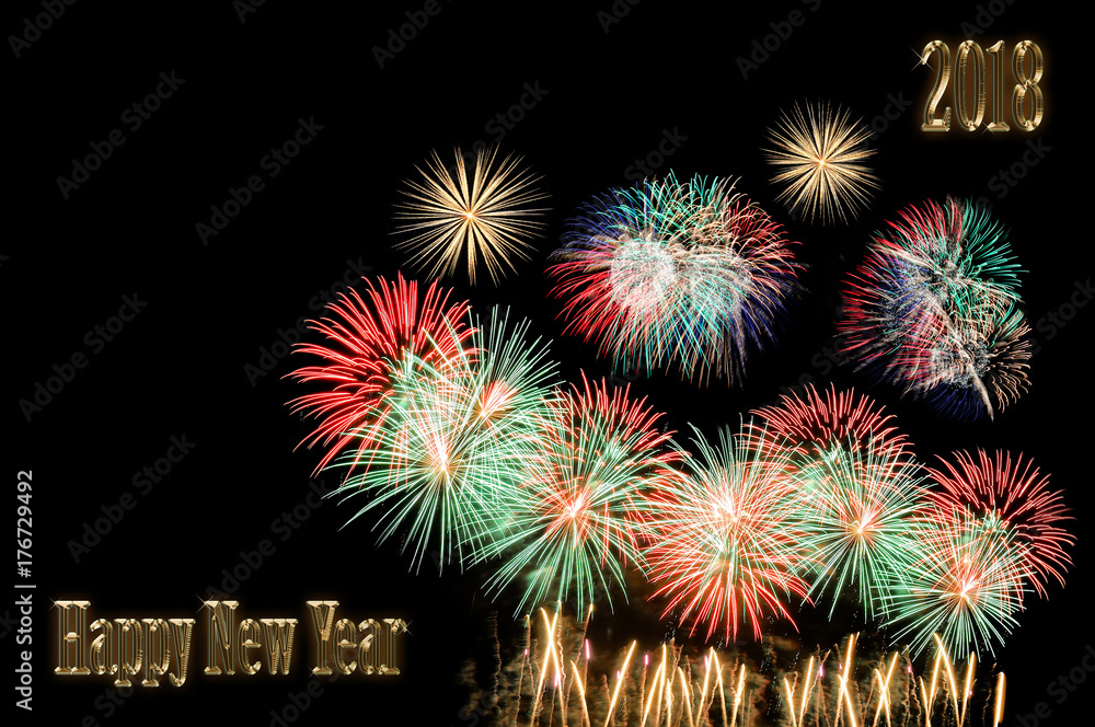 Happy new year 2018 text of gold color and fireworks Happy new year 2018 text of gold color and fireworks