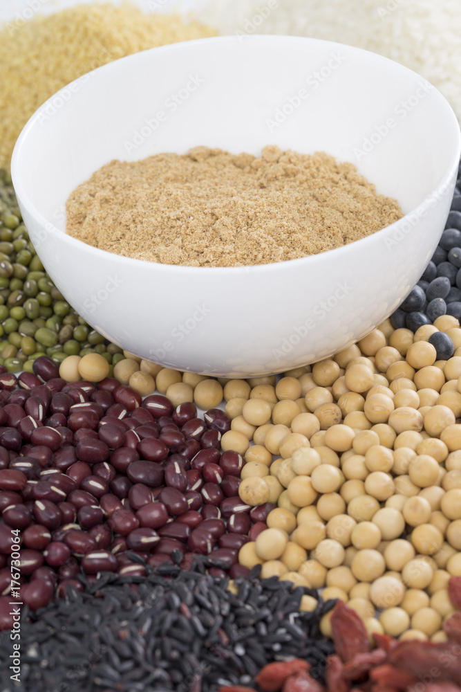 A variety of beans ground into powder. Black rice , ice, millet, beans, goji (wolfberry), and grind up those to make some kind of healthy food flour. It is a popular food in China, and named wugufen. A variety of beans ground into powder. Black rice , ice, millet, beans, goji (wolfberry), and grind up those to make some kind of healthy food flour. It is a popular food in China, and named wugufen.