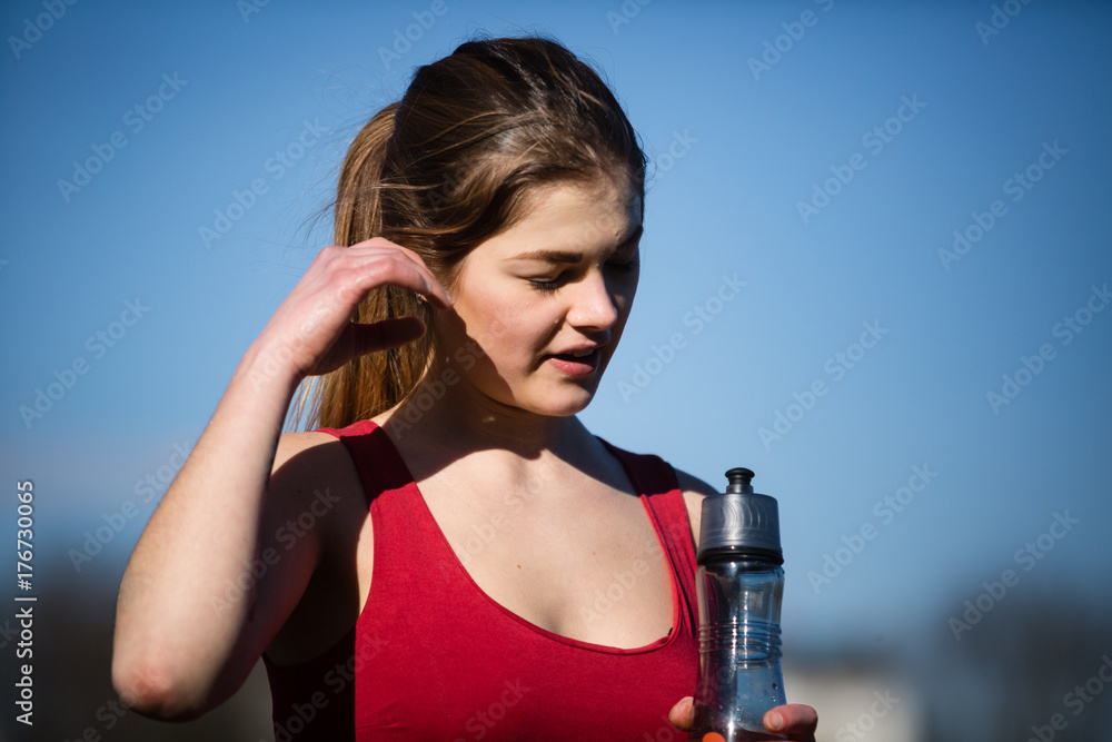 Beautiful, young and sweaty woman after workout outdoors Beautiful, young and sweaty woman after workout outdoors