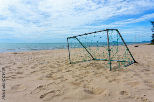 goal football or soccer on the beach with nest and blue sky with beautiful cloud in a sunny day. sport on the beach or goal and success concept.