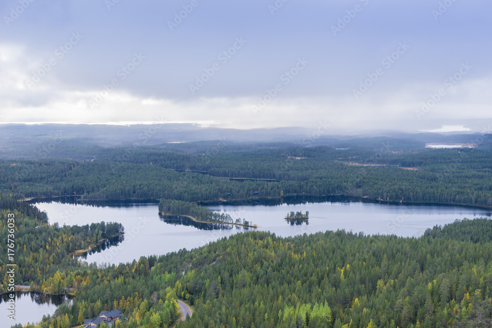 Fototapeta premium Mountains, forests, lakes view in autumn. Fall colors - ruska time in Konttainen. One part of Karhunkierros Trail. National park in Finland. Lapland, Nordic countries in Europe