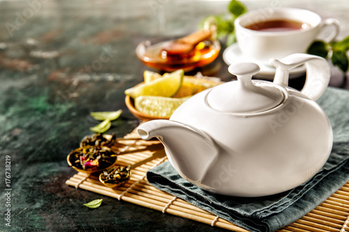 Photos Composition of tea-set and condiments
