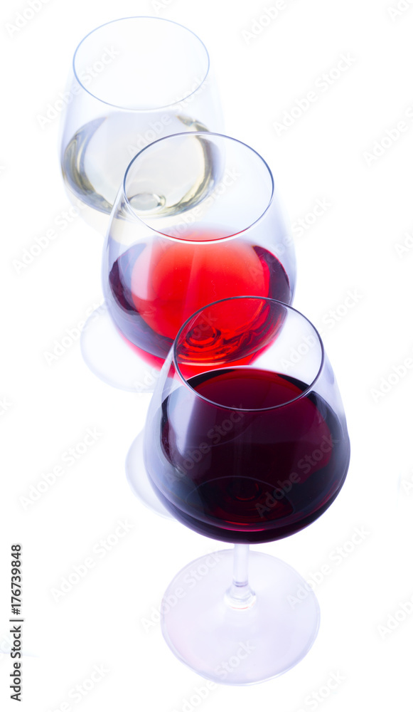 Set of three wine glasses with red, white and rose wine isolated on white background Set of three wine glasses with red, white and rose wine isolated on white background