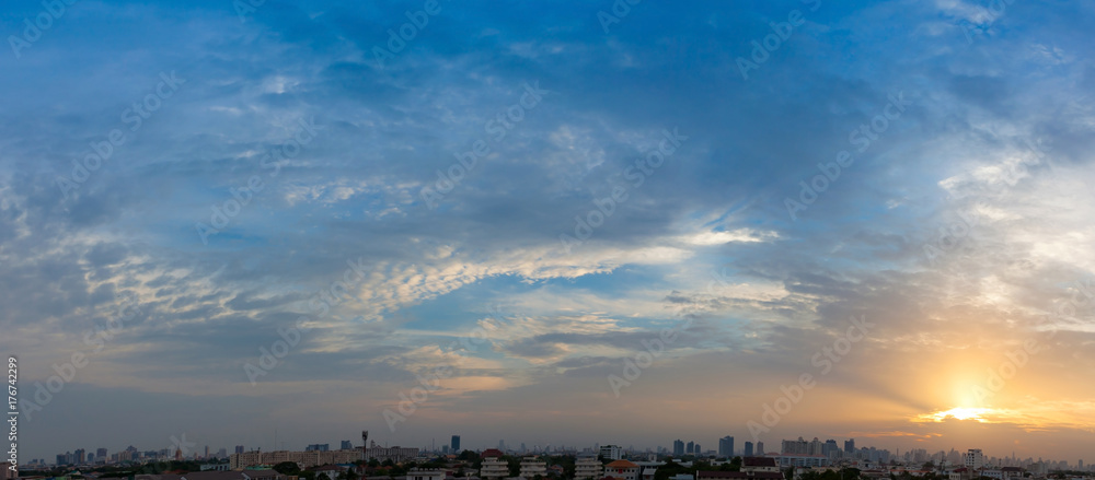 Panoramic aerial view of dramatic blue sky.