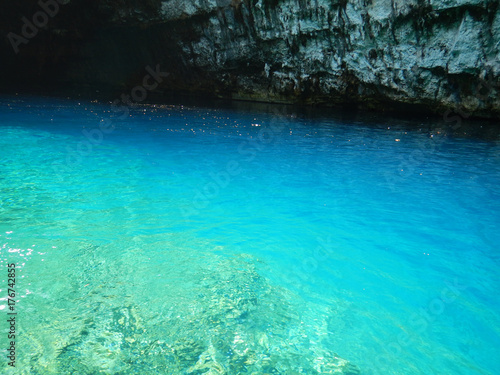 The turquoise water of the underground Melissani lake in Cephalonia or Kefalonia in Greece.