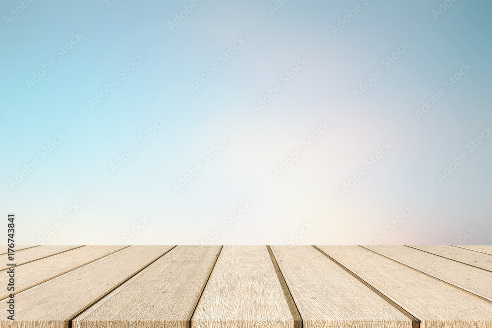 blurred natural blue sky gradient glow backdrop wall with old white wood texture panel color background texture table top.advertise,show,promote products on display 