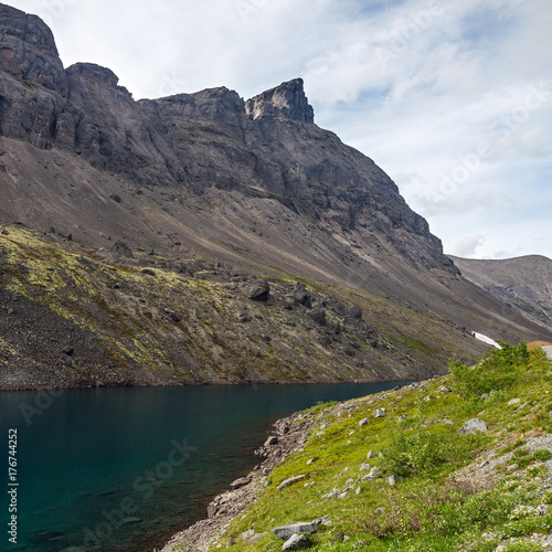 Mountain lake with clear water. Kola Peninsula , Khibiny . Russia.