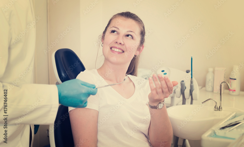 Fototapeta premium Adult woman is taking advice from doctor