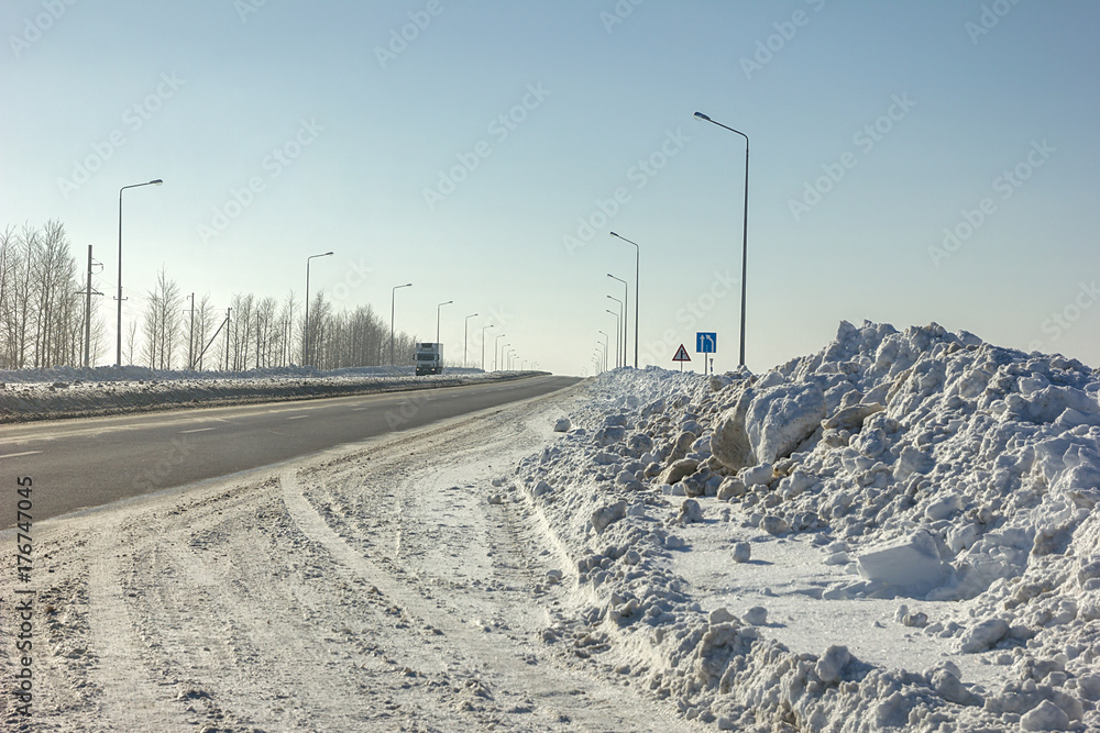 Winter road in a sunny day