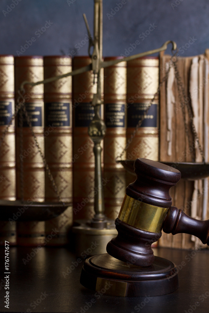 Law and justice concept - law gavel with row of books
