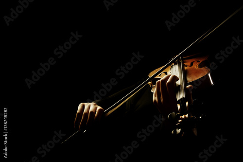 Obraz na plátně Violin player. Violinist playing violin hands bow