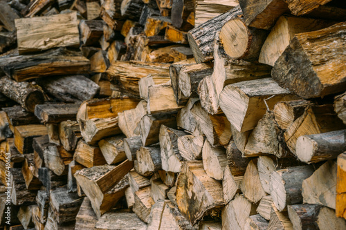 Pile of firewood, dry firewood background
