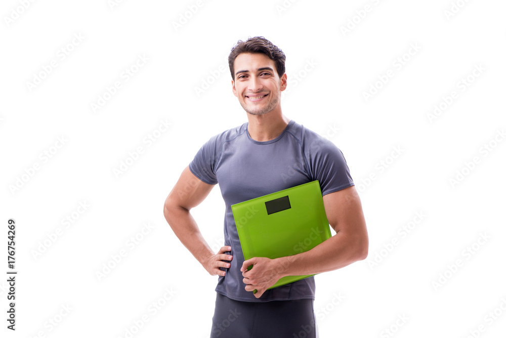 Man with scales in sports and health concept isolated on white Man with scales in sports and health concept isolated on white