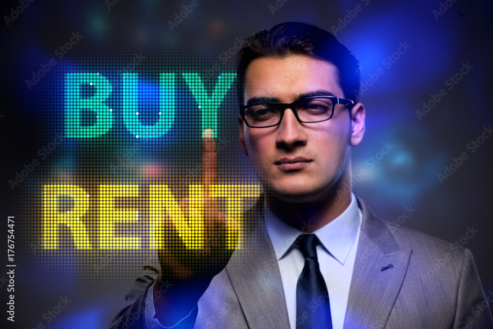 Businessman facing dilemma of buying versus renting Businessman facing dilemma of buying versus renting