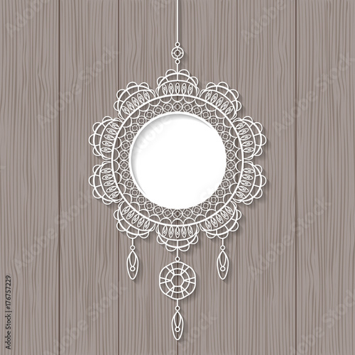White lace pendant on wooden background. Decorative design element, lacy holiday decoration for Christmas and New Year. Vector illustration
