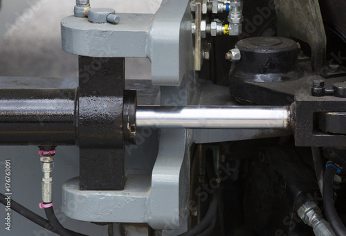 Chrome-plated hydraulic mechanism close - up shot 