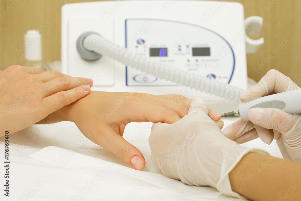 Photography Manicure master during work