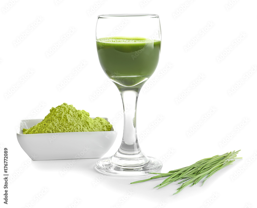 Shot of wheat grass drink on white background