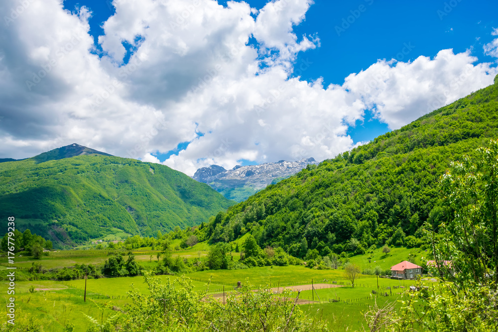 In a picturesque valley among the mountains there is a small village.