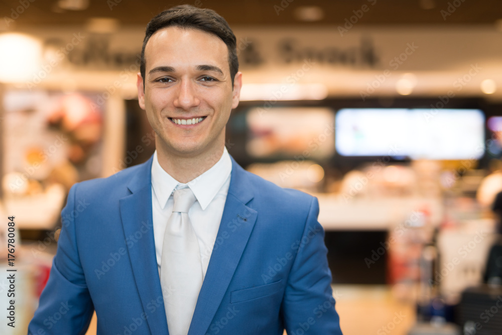 Smiling man in a store Smiling man in a store
