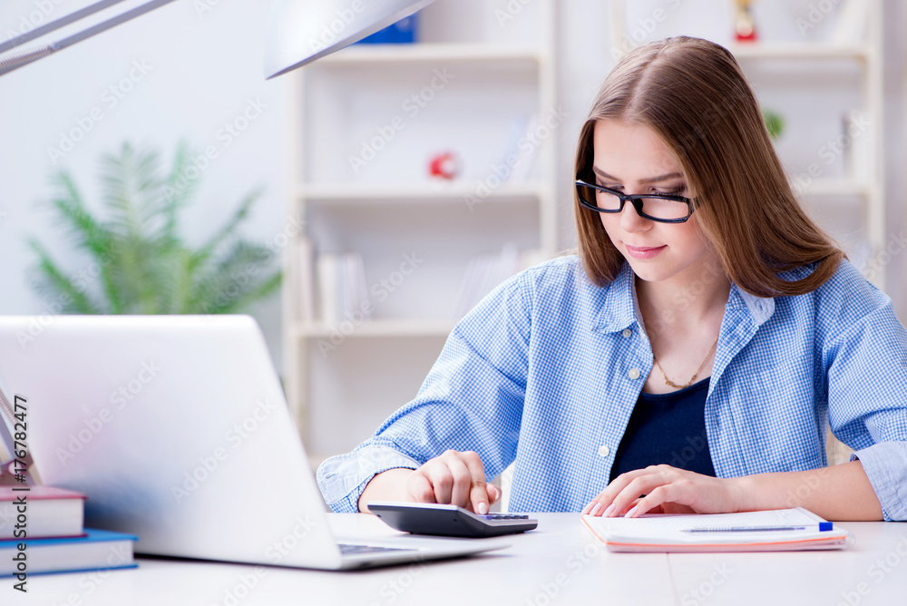 Young teenage female student preparing for exams at home Young teenage female student preparing for exams at home
