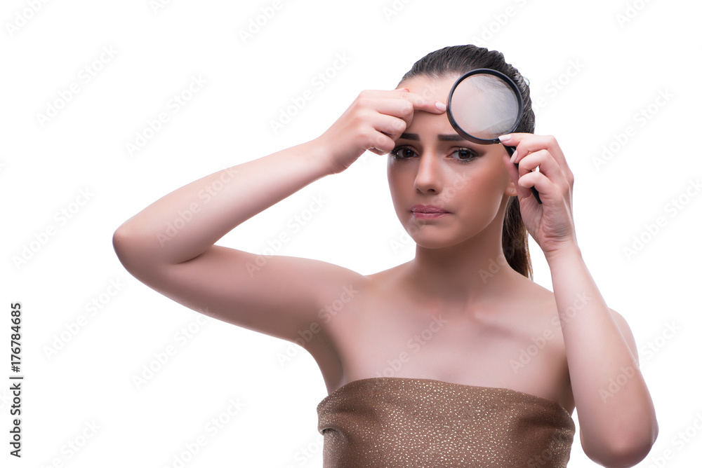 Woman in beauty concept with magnifying glass aging wrinkles Woman in beauty concept with magnifying glass aging wrinkles