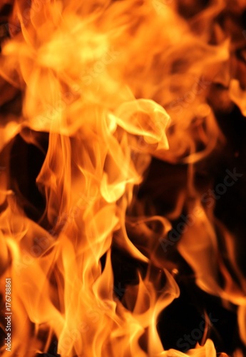 fire and flames burning inferno full screen background with copy space  © cheekylorns