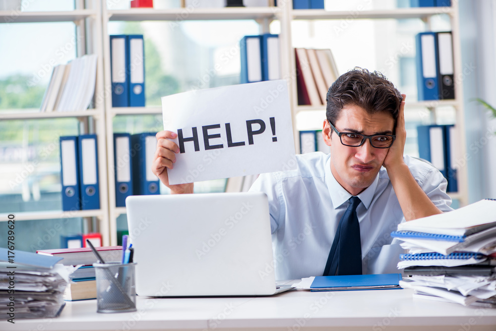 Young businessman asking for help in office Young businessman asking for help in office