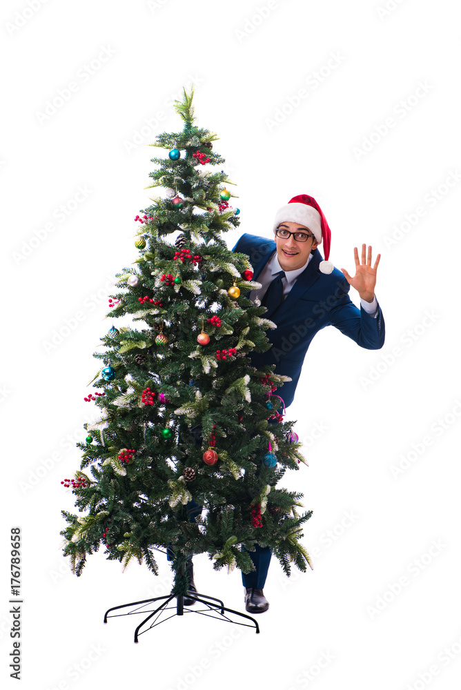 Businessman decorating christmas tree isolated on white Businessman decorating christmas tree isolated on white
