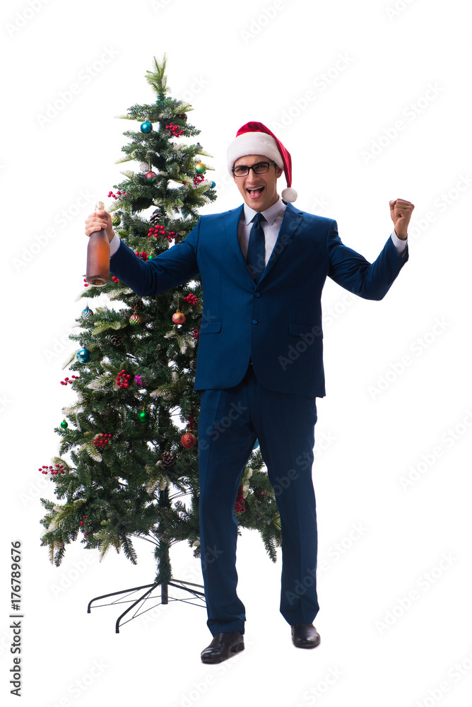 Businessman decorating christmas tree isolated on white Businessman decorating christmas tree isolated on white