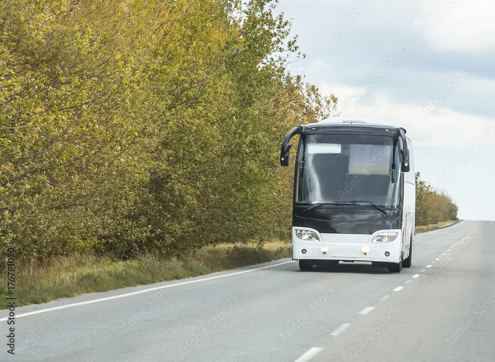 tourist bus goes on the highway