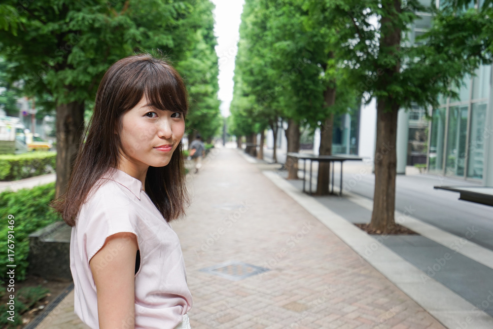 Young woman walking on street Young woman walking on street