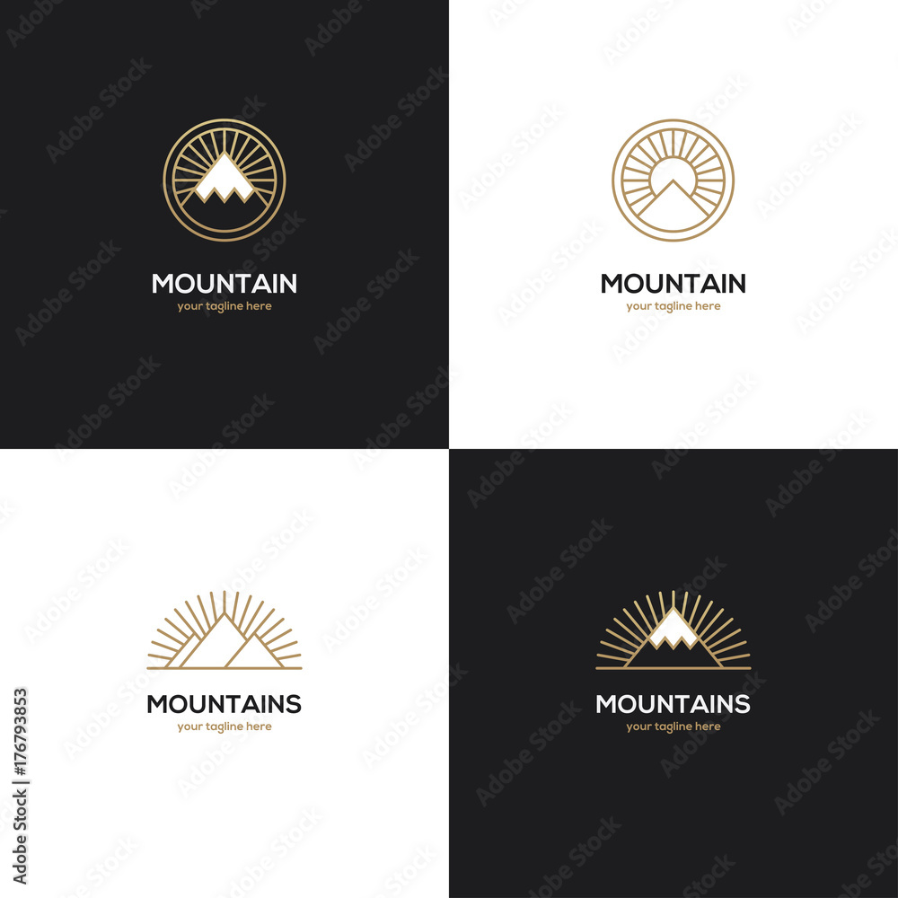 Fototapeta premium Cztery górskie logo w złotym kolorze.