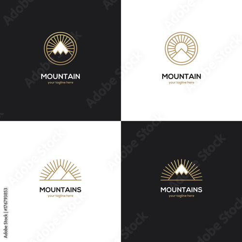 Four mountain logo in golden color.