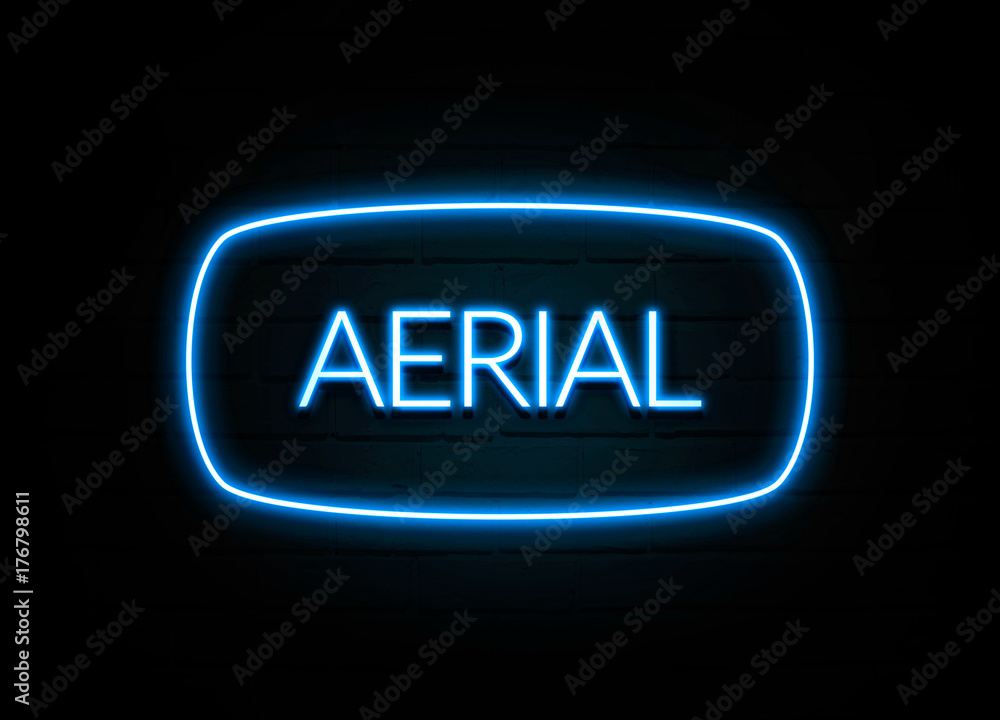 Aerial - colorful Neon Sign on brickwall Aerial - colorful Neon Sign on brickwall