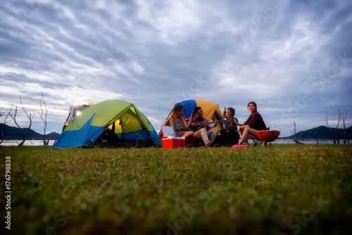 Group of Young Asian Camper Enjoy Camping Outdoors . Holiday , vacation , summer concept .