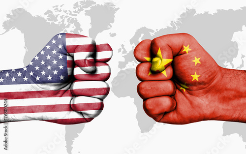 Conflict between USA and China - male fists photo
