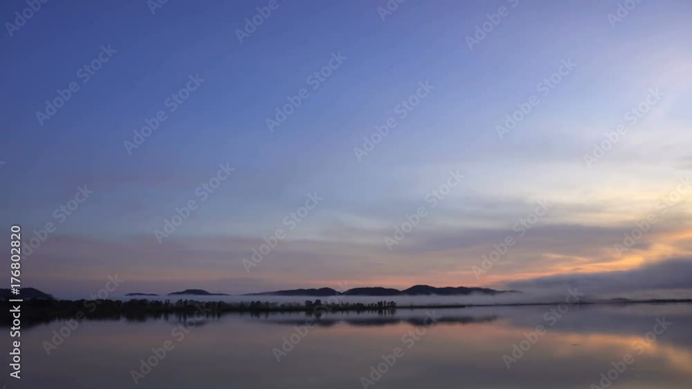 Early morning fog and mist above a quiet lake
Early morning fog and mist above a quiet lake