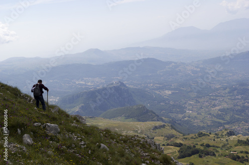 hiker on mountain trail © ciroorabona