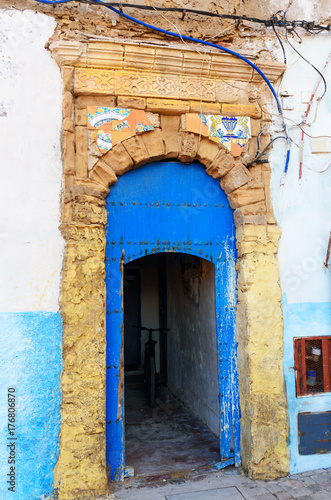 Traditional Moroccan blue door in medina © Elena Odareeva