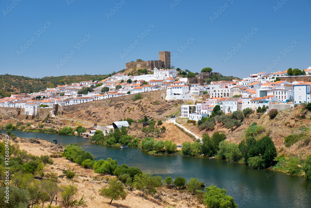 The view of Mertola town over the Guadiana river. Portugal