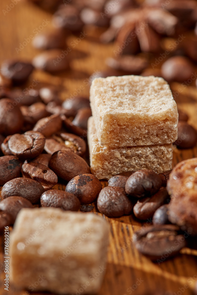 Aroma coffee chocolate cookies and spices on the wooden table. Dark wooden background. Top view. Close. Closeup.