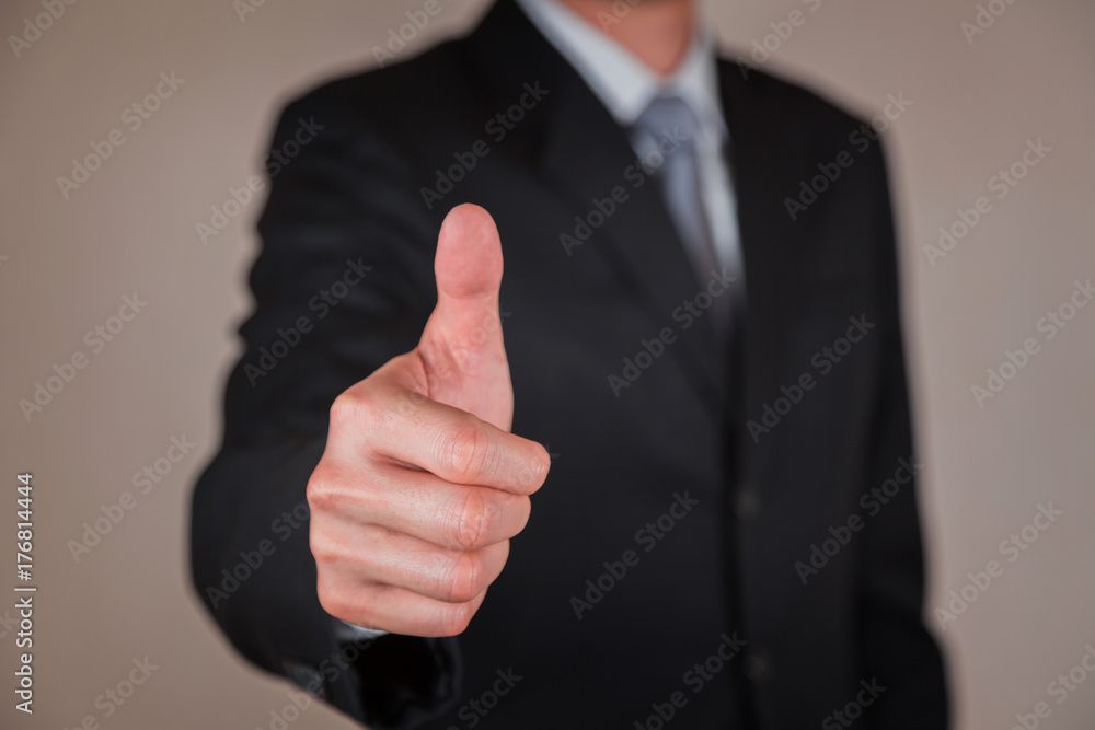 Businessman give a thumbs up for compliment as praise, congratulate, good and like concept. Businessman give a thumbs up for compliment as praise, congratulate, good and like concept.